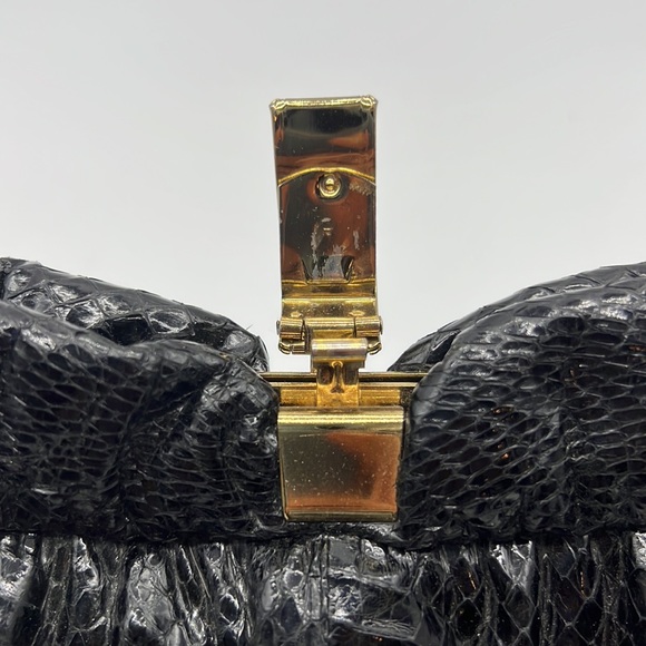 Black skin clutch with gold colored closure - Picture 3 of 4